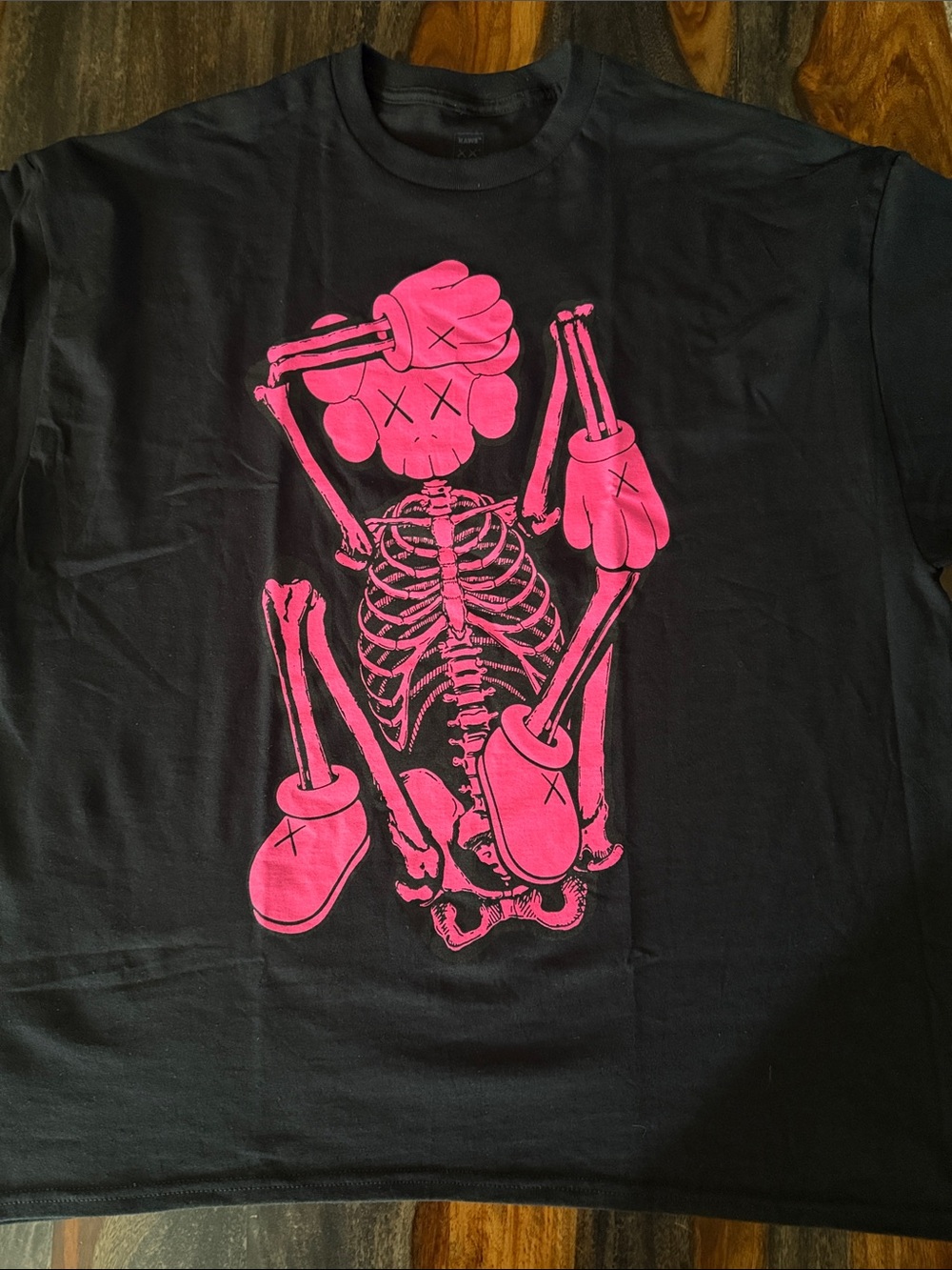 Kaws Skeleton New Fiction Black Tee with Hot Pink Skeleton Graphic